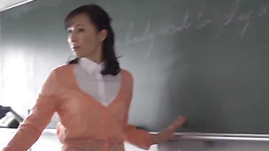 Seductive Asian teacher Nobuko Terabayashi masturbates at her desk