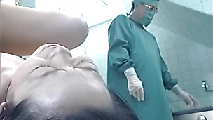 Japanese AV Model wide open as doctor gives an enema